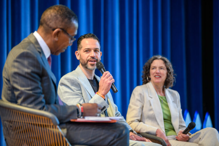 Michael Esposito speaking with SUNY New Paltz President at Inauguration Regional Impact Panel