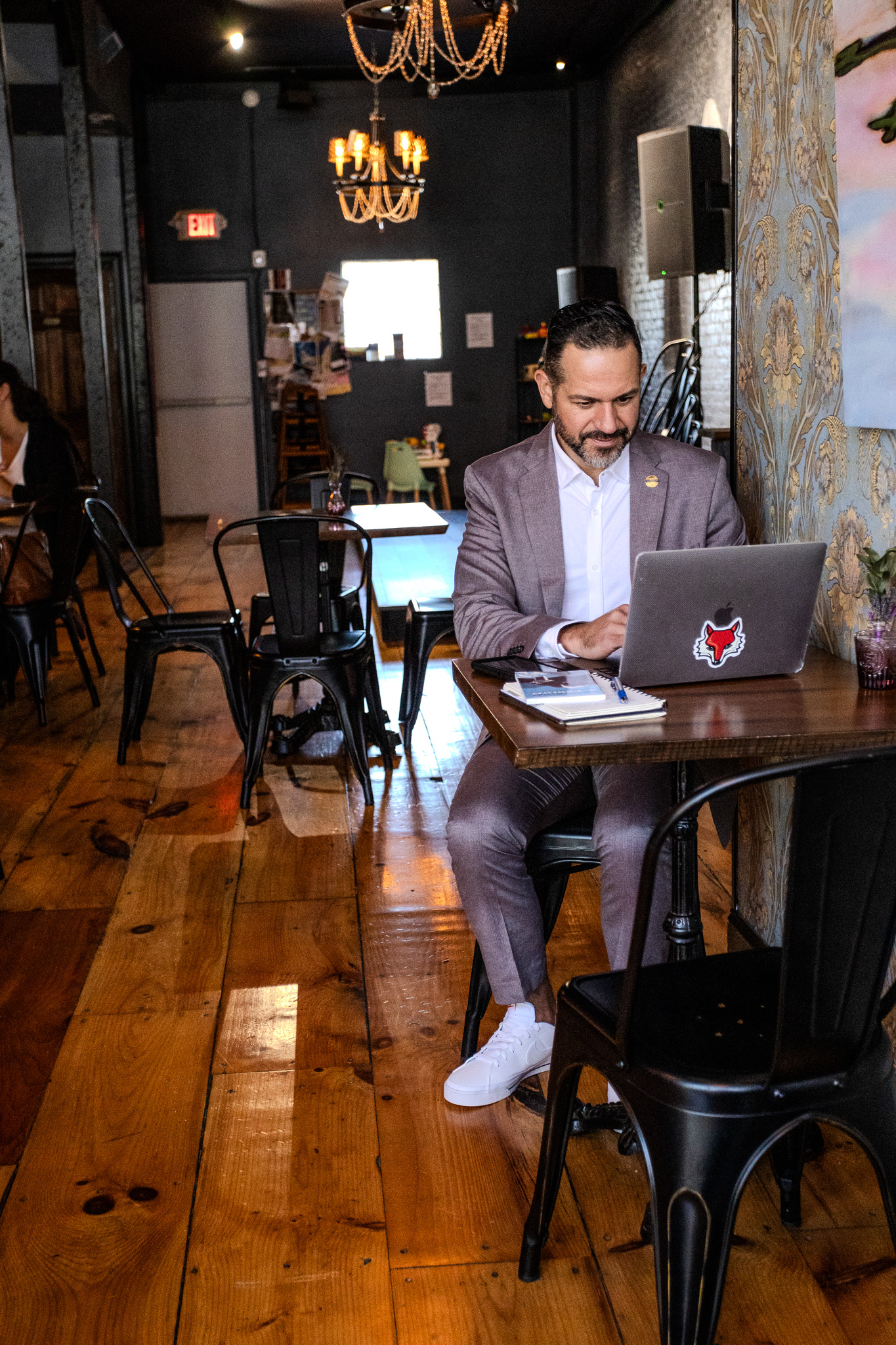 michael esposito in wappingers coffee shop on a computer