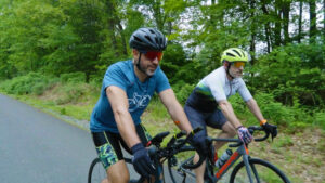 Michael Esposito and Tom Langan riding bicycles for Pedal for Purpose fundraiser in Hudson Valley NY